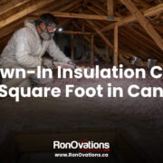 Professional blown-in insulation installation in a Canadian attic